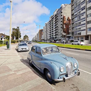 Uruguay, Montevideo, Vintage car parked by the Rambla