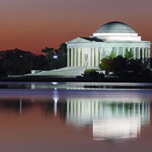 USA, Washington DC, Jefferson Memorial and reflection in the Tidal Basin, dawn
