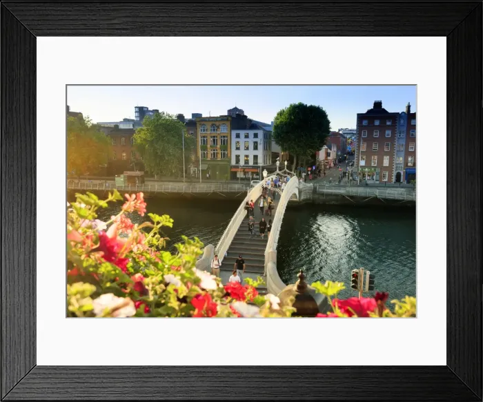 Framed Print : Europe, Dublin, Ireland, tourists crossing the famous Halfpenny bridge on the Liffey Framed Print : Europe, Dublin, Ireland, tourists crossing the famous Halfpenny bridge on the Liffey