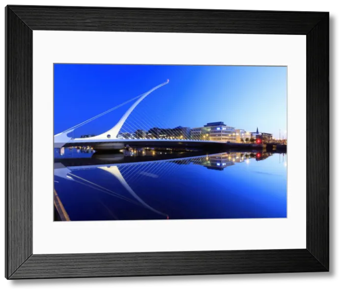 Framed Print : Europe, Dublin, Ireland, Samuel Beckett bridge by night reflecting on the Liffey river
