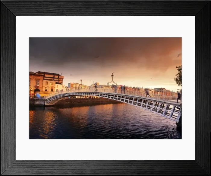 Framed Print : Europe, Dublin, Ireland, people crossing Halfpenny bridge on the Liffey river at sunset Framed Print : Europe, Dublin, Ireland, people crossing Halfpenny bridge on the Liffey river at sunset