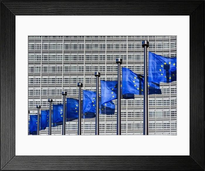Framed Print : Flags of European Union weaving outside the European Commission building, Brussels Framed Print : Flags of European Union weaving outside the European Commission building, Brussels