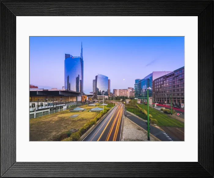 Framed Print : Milan, Lombardy, Italy. Traffics light trails in the financial district of Porta Nuova Framed Print : Milan, Lombardy, Italy. Traffics light trails in the financial district of Porta Nuova