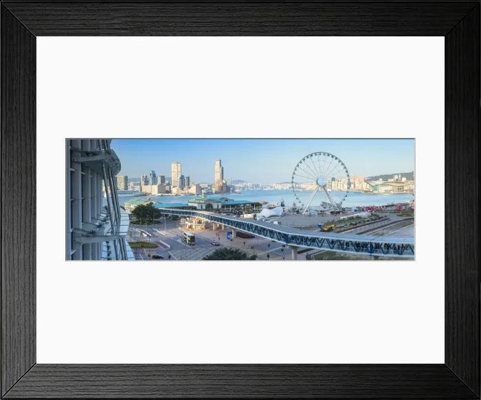 Framed Print : View of Star Ferry pier, observation wheel and Tsim Sha Tsui skyline, Hong Kong, China Framed Print : View of Star Ferry pier, observation wheel and Tsim Sha Tsui skyline, Hong Kong, China