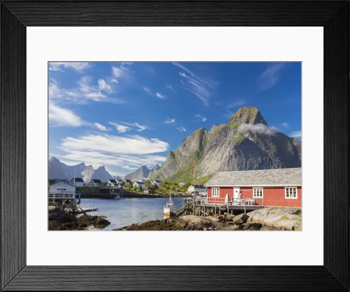 Framed Print : Typical house of fishermen called Rorbu framed by rocky peaks and blue sea Reine Framed Print : Typical house of fishermen called Rorbu framed by rocky peaks and blue sea Reine