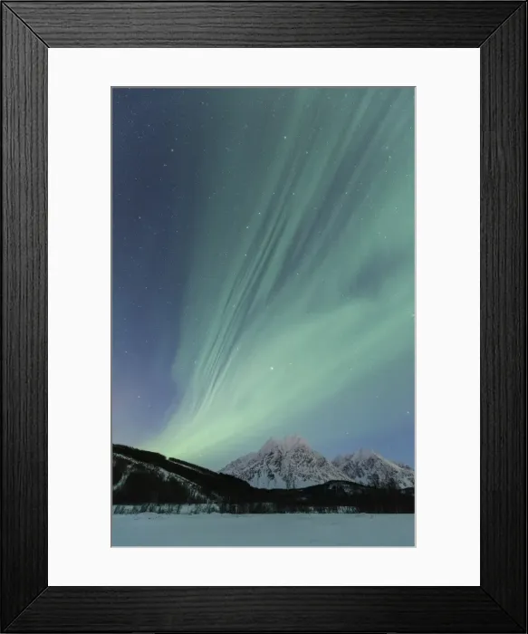 Framed Print : Aurora Borealis illuminates the landscape with views of the Lyngen Alps. Svensby Framed Print : Aurora Borealis illuminates the landscape with views of the Lyngen Alps. Svensby