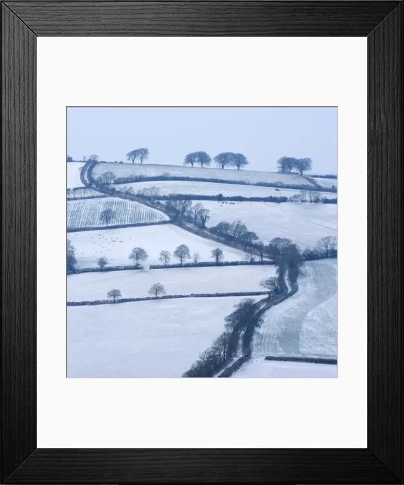 Framed Print : Snow covered winding country lane and rural landscape near Stockleigh Pomeroy, Mid Devon, England Framed Print : Snow covered winding country lane and rural landscape near Stockleigh Pomeroy, Mid Devon, England