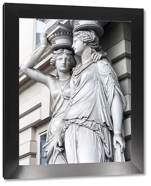 Caryatid sculpted female figure statues in the historic centre, Vienna, Austria