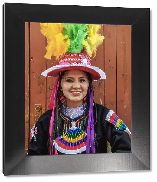 Girl in traditional clothing, Fiesta de la Virgen de la Candelaria, Puno, Peru