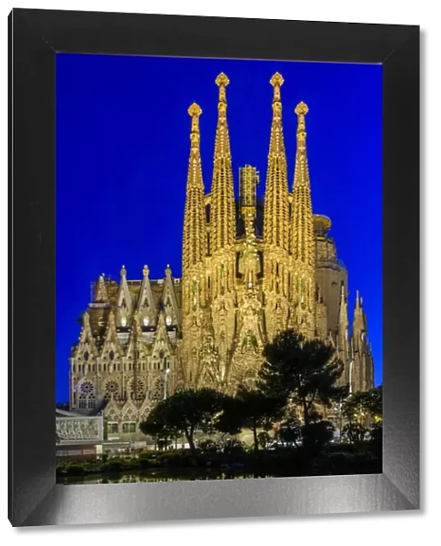 Night view of the Nativity facade of Sagrada Familia basilica church, Barcelona, Catalonia