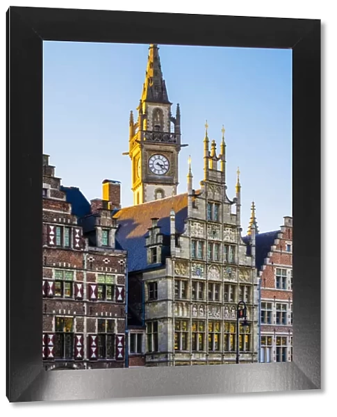 Belgium, Flanders, Ghent (Gent). Old Post Office clocktower and medieval guild houses