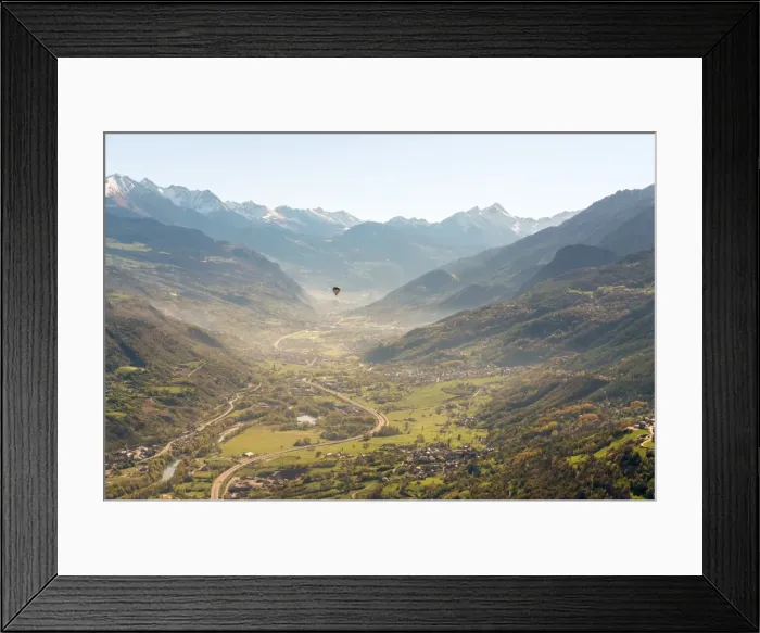 Framed Print : hot air balloon flies over Aosta city, Valle d Aosta, Italy, Europe