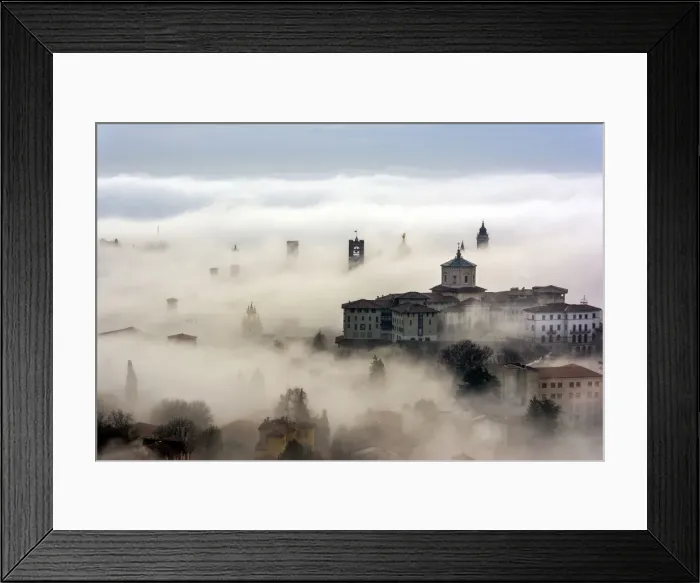 Framed Print : Bergamo, Lombardy, Italy. Foggy sunrise over high city Framed Print : Bergamo, Lombardy, Italy. Foggy sunrise over high city
