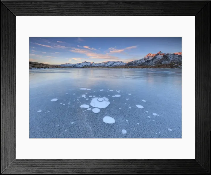 Framed Print : Ice bubbles on the frozen surface of Andossi Lake at sunrise Spluga Valley Valtellina Framed Print : Ice bubbles on the frozen surface of Andossi Lake at sunrise Spluga Valley Valtellina