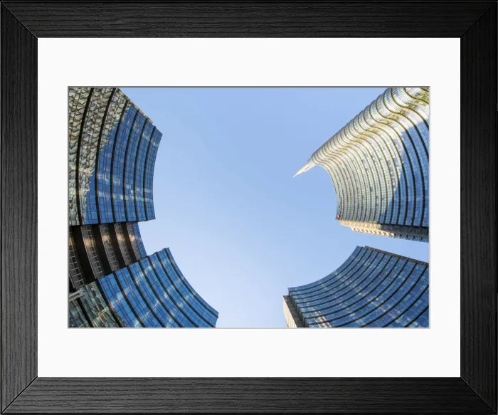 Framed Print : Milan, Lombardy, Italy. Upward view of the skyscrapers of the Porta Nuova business Framed Print : Milan, Lombardy, Italy. Upward view of the skyscrapers of the Porta Nuova business