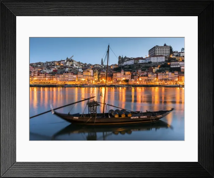 Framed Print : Traditional Rabelo boat designed to carry wine down Douro river with city skyline behind Framed Print : Traditional Rabelo boat designed to carry wine down Douro river with city skyline behind