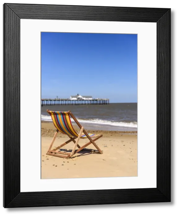 Framed Print : UK, England, Suffolk, Southwold, Southwold Beach and Pier, Deckchair Framed Print : UK, England, Suffolk, Southwold, Southwold Beach and Pier, Deckchair