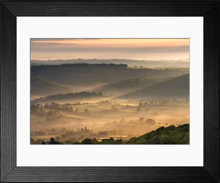 Framed Print : Mist covered rolling countryside at dawn, Dartmoor National Park, Devon, England Framed Print : Mist covered rolling countryside at dawn, Dartmoor National Park, Devon, England