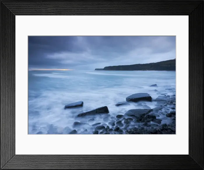 Framed Print : Stormy sunset at Kimmeridge Bay on the Jurassic Coast, Dorset, England. Winter