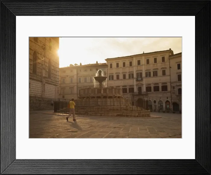 Framed Print : Woman walking past Fontana Maggiore in Piazza IV Novembre at dawn Perugia, Umbria, Italy Framed Print : Woman walking past Fontana Maggiore in Piazza IV Novembre at dawn Perugia, Umbria, Italy