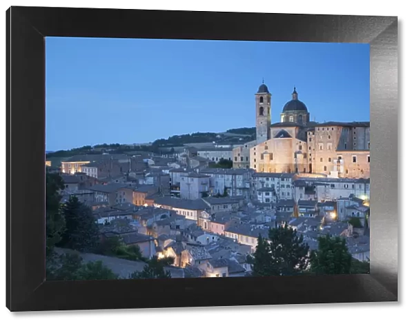 View of Urbino (UNESCO World Heritage Site) at dusk, Le Marche, Italy