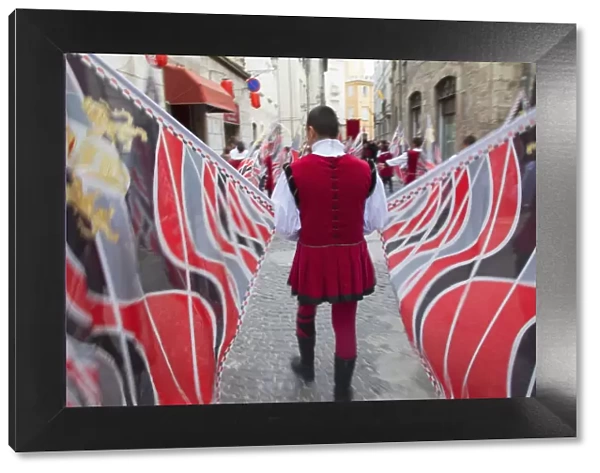 Flag bearer in medieval festival of La Quintana, Ascoli Piceno, Le Marche, Italy