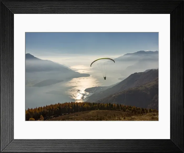 Framed Print : Paragliding over Lake Como and the surroundings mountains. Alto Lario, Como, Lombardy Framed Print : Paragliding over Lake Como and the surroundings mountains. Alto Lario, Como, Lombardy