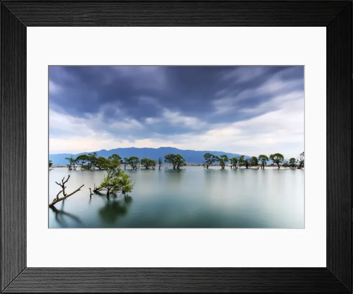 Framed Print : Sunset over one of the many lakes in the village of Heqing in Yunnan, China Framed Print : Sunset over one of the many lakes in the village of Heqing in Yunnan, China