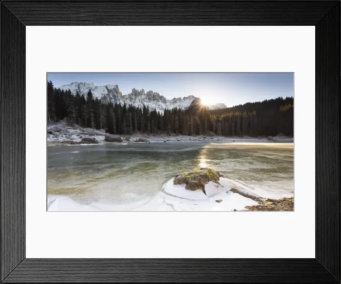 Framed Print : a suggestive sunset at Karersee where the last sun reflected on the iced lake, Bolzano province Framed Print : a suggestive sunset at Karersee where the last sun reflected on the iced lake, Bolzano province