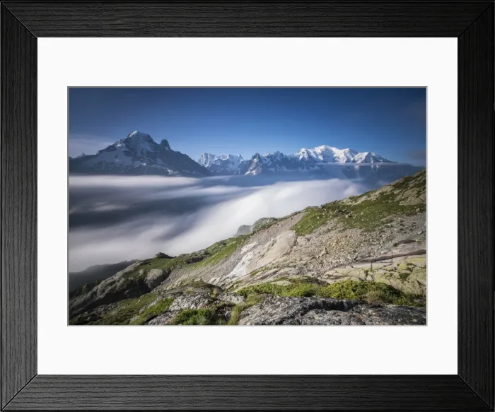 Framed Print : Low clouds and mist frame the snowy peaks of Mont Blanc and Aiguille Verte Chamonix Framed Print : Low clouds and mist frame the snowy peaks of Mont Blanc and Aiguille Verte Chamonix