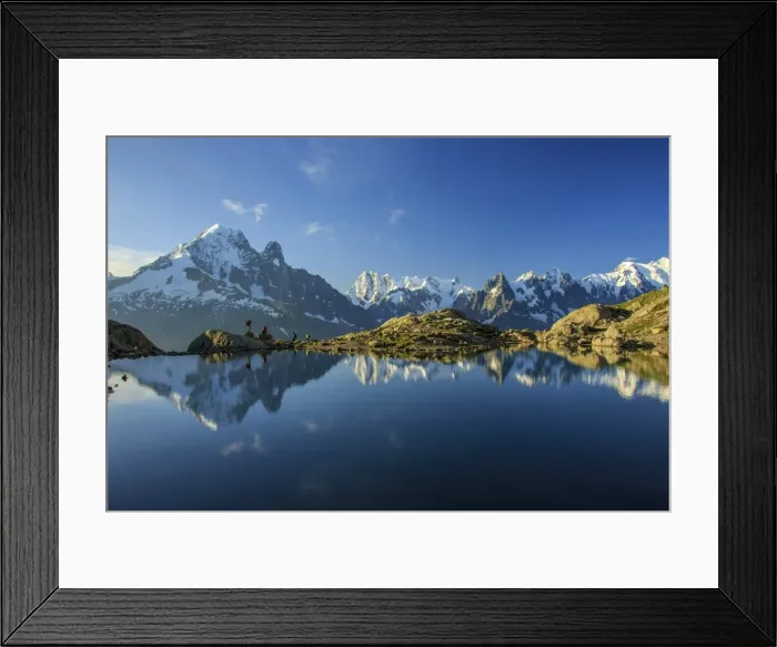Framed Print : Photographers and hikers on the shore of Lac De Cheserys at dawn Haute Savoie France Framed Print : Photographers and hikers on the shore of Lac De Cheserys at dawn Haute Savoie France