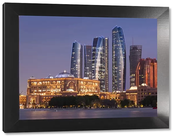 UAE, Abu Dhabi, Etihad Towers and Emirates Palace Hotel, dusk