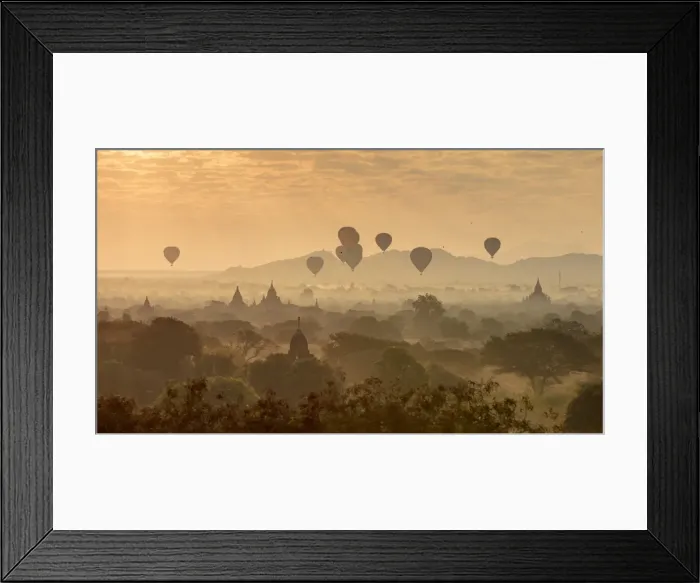 Framed Print : Hot air balloons fly over the temples of Bagan at sunrise on a misty morning, Myanmar