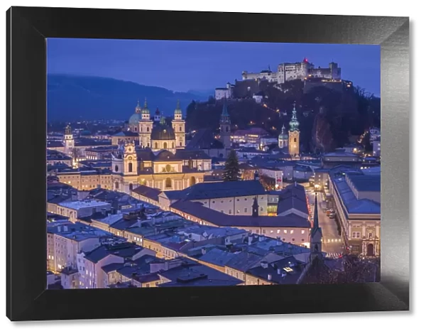 Austria, Salzburgerland, Salzburg, elevated city view, dusk