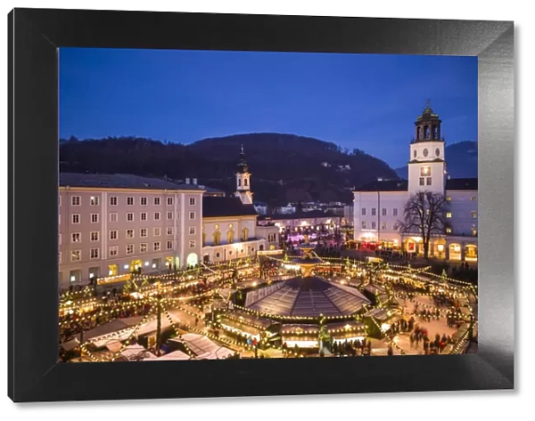 Austria, Salzburgerland, Salzburg, Christmas Market, Residenzplatz, elevated view, dusk