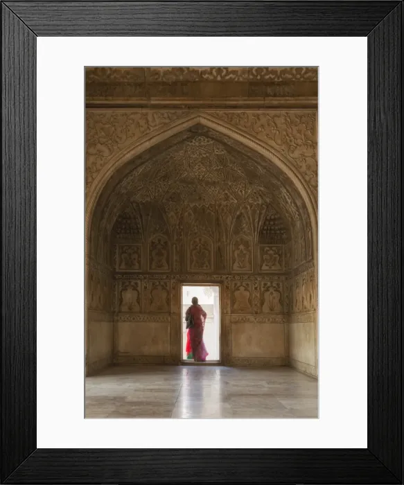 Framed Print : India, Uttar Pradesh, Agra, Agra Fort, a woman in a red saree walks through the interior