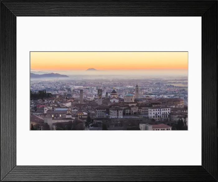 Framed Print : Bergamo, Lombardy, Italy. High angle view over Upper Town (Citta Alta) at sunrise Framed Print : Bergamo, Lombardy, Italy. High angle view over Upper Town (Citta Alta) at sunrise