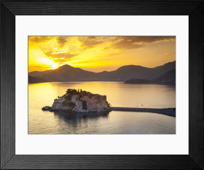 Framed Print : The picturesque island village of Sveti Stephan illuminated at sunset, Sveti Stephan Framed Print : The picturesque island village of Sveti Stephan illuminated at sunset, Sveti Stephan