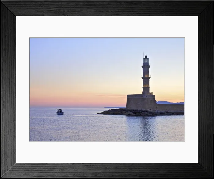 Framed Print : The Lighthouse and Fishing Boat in The Venetian Harbour at Sunrise, Chania, Crete