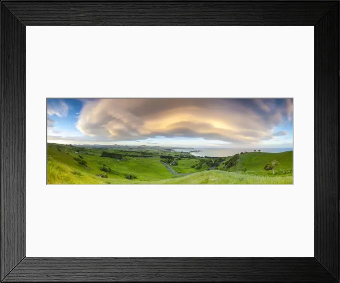 Framed Print : Dramatic cloud formations over the picturesque coastal settlement of Karitane, Otago