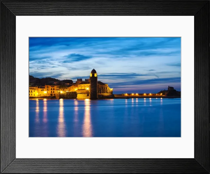 Framed Print : Sunset view towards Collioures bay and a lighthouse converted to Notre-Dame-des-Anges church Framed Print : Sunset view towards Collioures bay and a lighthouse converted to Notre-Dame-des-Anges church
