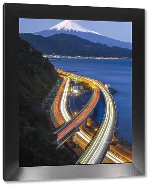 Mt. Fuji and traffic driving on the Tomei Expressway, Shizuoka, Honshu, Japan