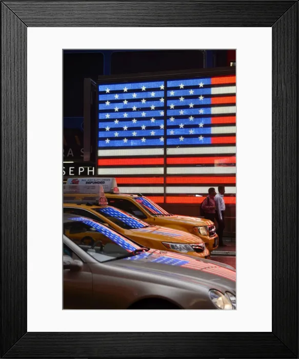 Framed Print : People walking past Neon sign of American Flag on Times Square, New York, Manhattan, USA Framed Print : People walking past Neon sign of American Flag on Times Square, New York, Manhattan, USA