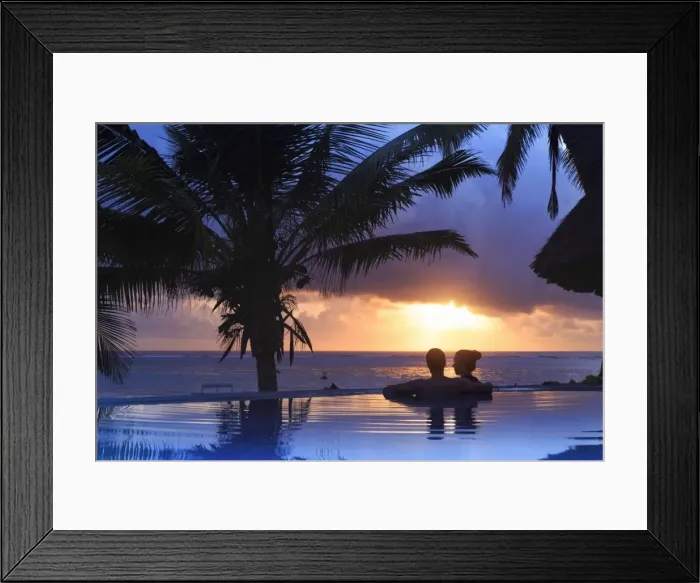 Framed Print : Tanzania. Zanzibar, Kigomani, Couple relaxing inside infinity pool overlooking Framed Print : Tanzania. Zanzibar, Kigomani, Couple relaxing inside infinity pool overlooking
