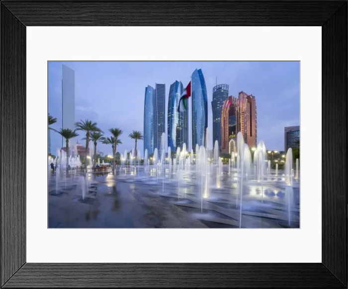 Framed Print : Etihad Towers time lapse viewed over the fountains of the Emirates Palace Hotel, Abu Dhabi Framed Print : Etihad Towers time lapse viewed over the fountains of the Emirates Palace Hotel, Abu Dhabi