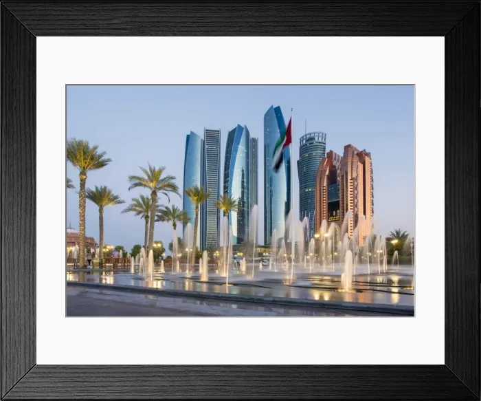 Framed Print : Etihad Towers time lapse viewed over the fountains of the Emirates Palace Hotel, Abu Dhabi