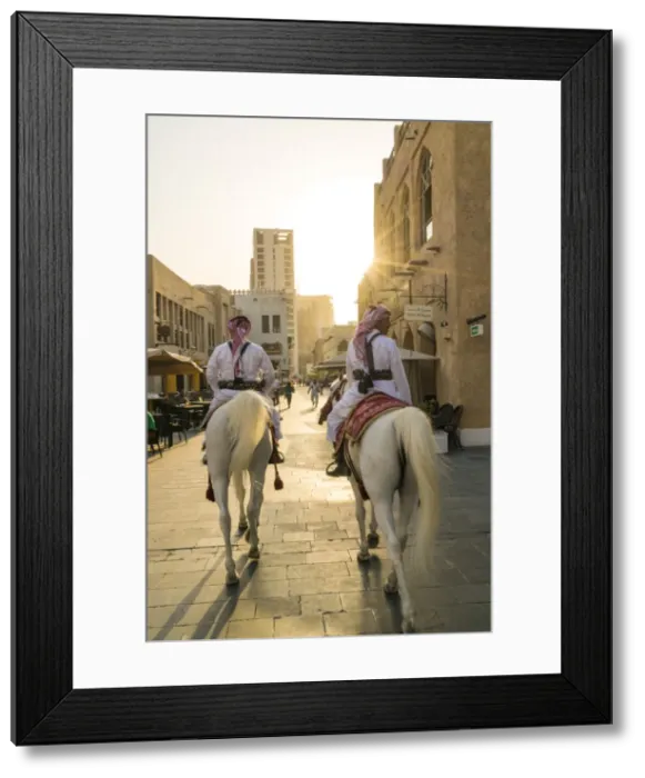 Framed Print : Mounted police on horses, Souq Waqif, Doha, Qatar
