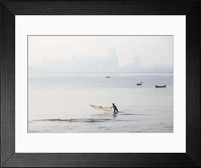 Framed Print : India, Maharashtra, Mumbai, Chowpatty, Man fishing Framed Print : India, Maharashtra, Mumbai, Chowpatty, Man fishing