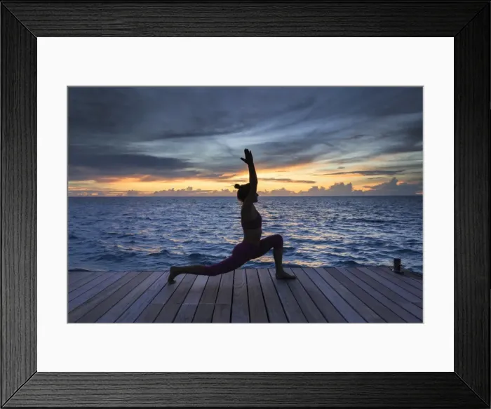 Framed Print : Maldives, South Ari Atoll, Thudufushi Island, Diamonds Thudufushi Resort, woman practising Framed Print : Maldives, South Ari Atoll, Thudufushi Island, Diamonds Thudufushi Resort, woman practising
