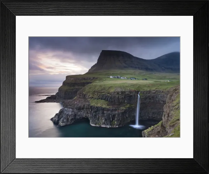 Framed Print : Dramatic coastal scenery at Gasadalur on the island of Vagar, Faroe Islands. Spring Framed Print : Dramatic coastal scenery at Gasadalur on the island of Vagar, Faroe Islands. Spring